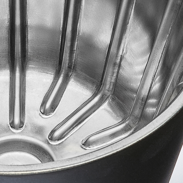 Double-wall stainless steel flat bottom filter basket.