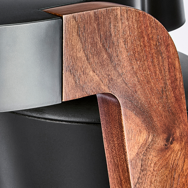 Hand-finished solid wood walnut trim.